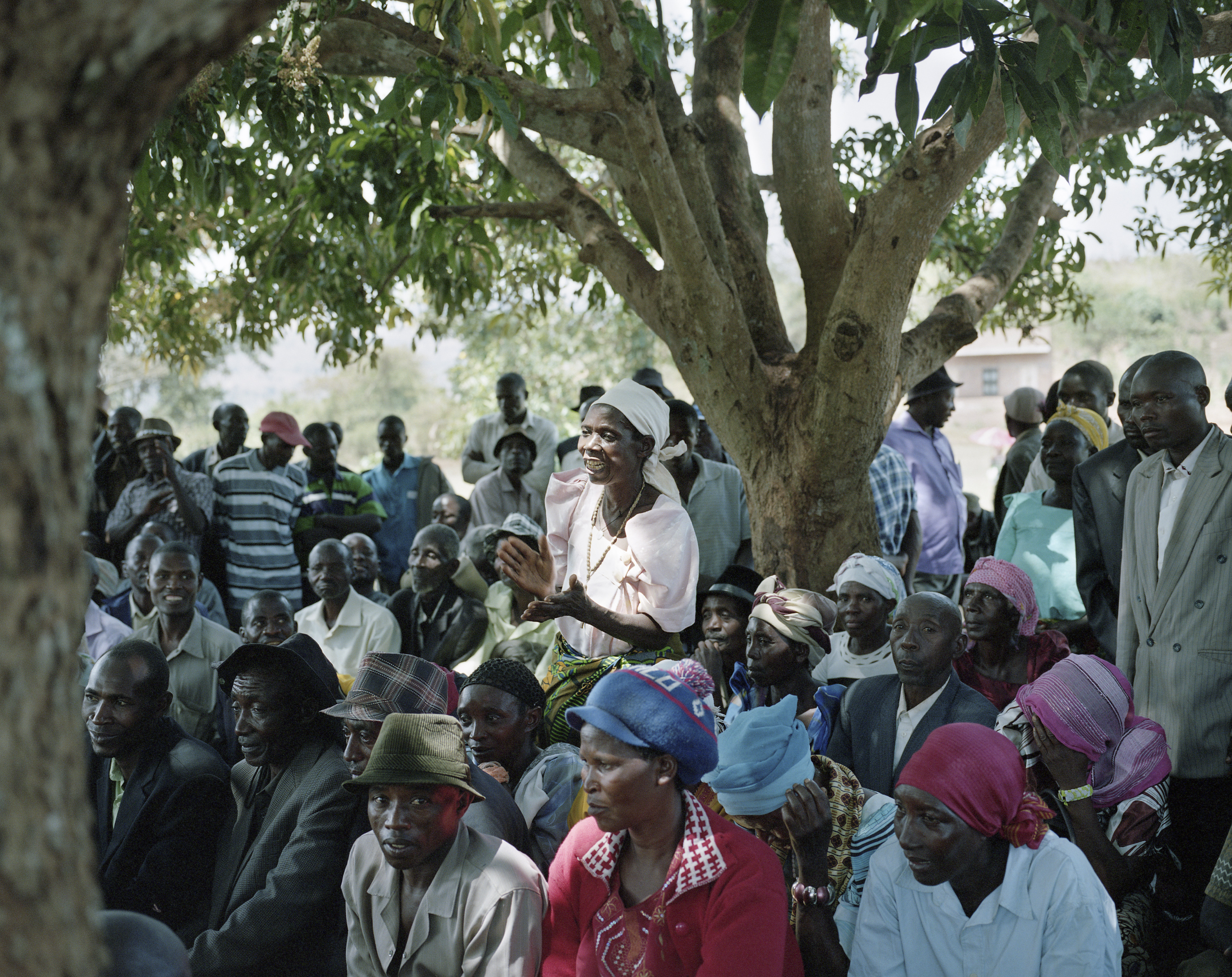 A woman from the Kiboga community speaks to the CAO